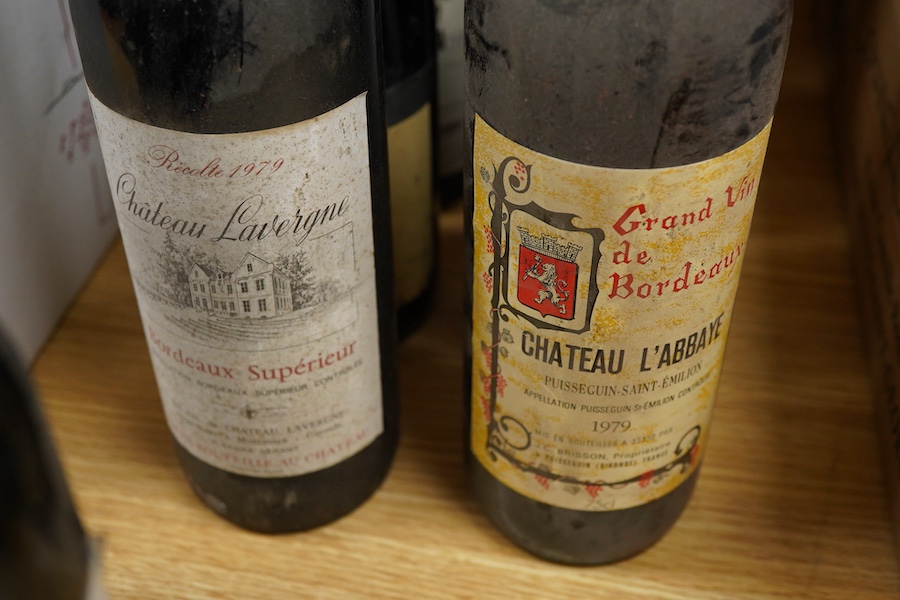 Nine bottles of wine; three Chateau Lavergne Bordeaux Superieur 1979, Beaune 1974, Côtes du Rhône 1978, Beaujolais 1979, etc.